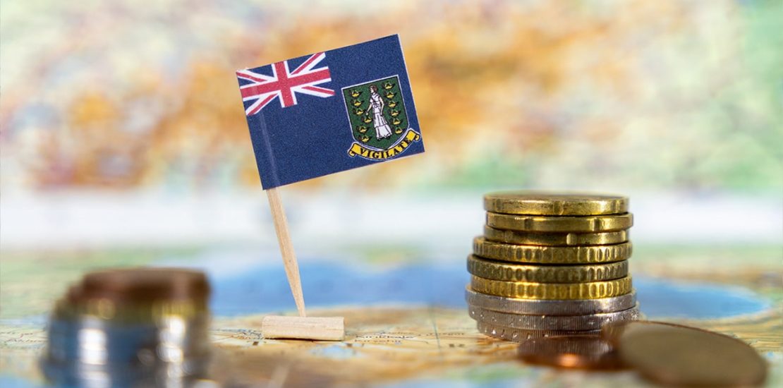a flag and some money on a map