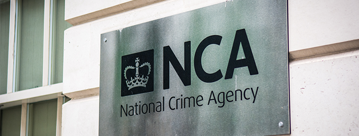The NCA plaque on a wall