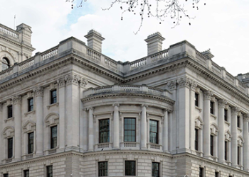 The front of a white stone building